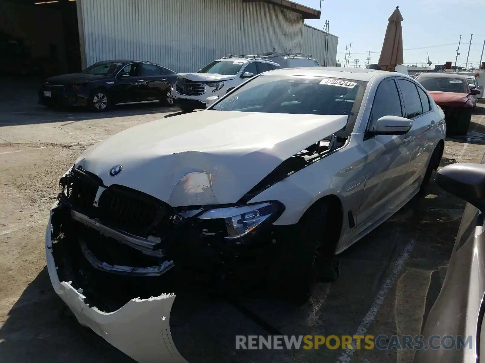 2 Photograph of a damaged car WBAJE5C57KWW13031 BMW 5 SERIES 2019