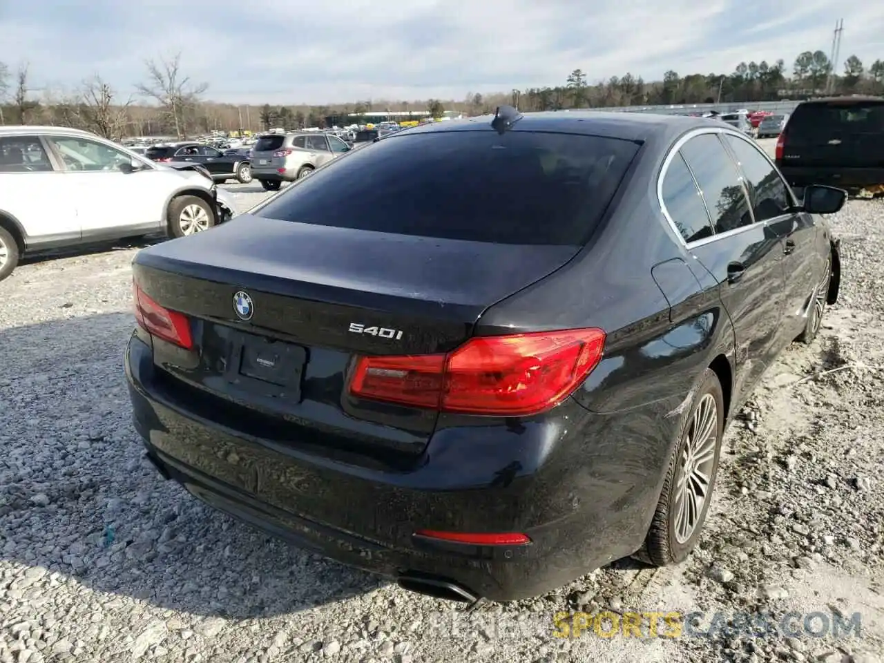 4 Photograph of a damaged car WBAJE5C58KWA98690 BMW 5 SERIES 2019