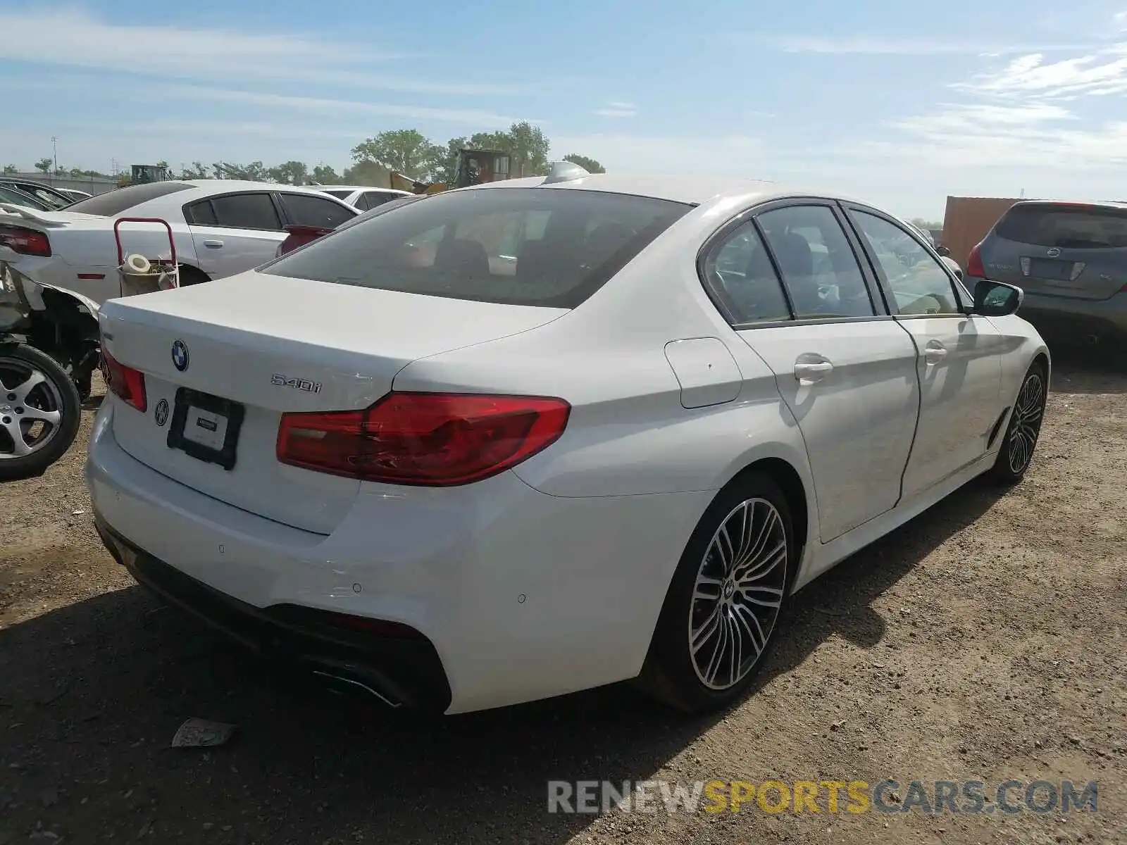 4 Photograph of a damaged car WBAJE7C50KWW28854 BMW 5 SERIES 2019