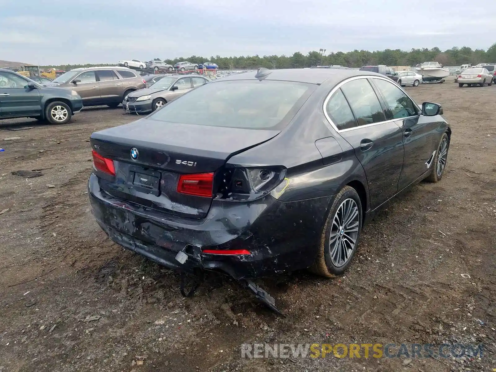 4 Photograph of a damaged car WBAJE7C51KWW19709 BMW 5 SERIES 2019