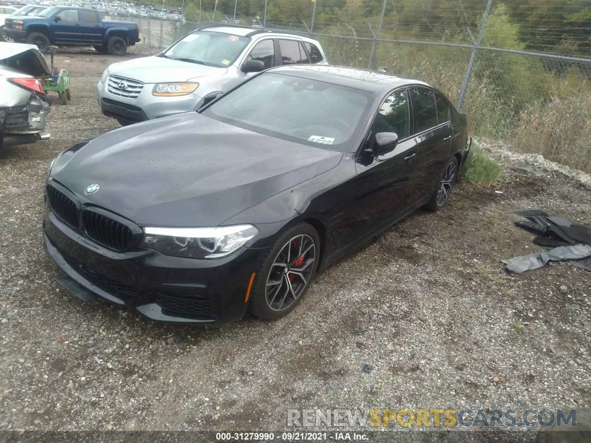 2 Photograph of a damaged car WBAJE7C52KWW08007 BMW 5 SERIES 2019