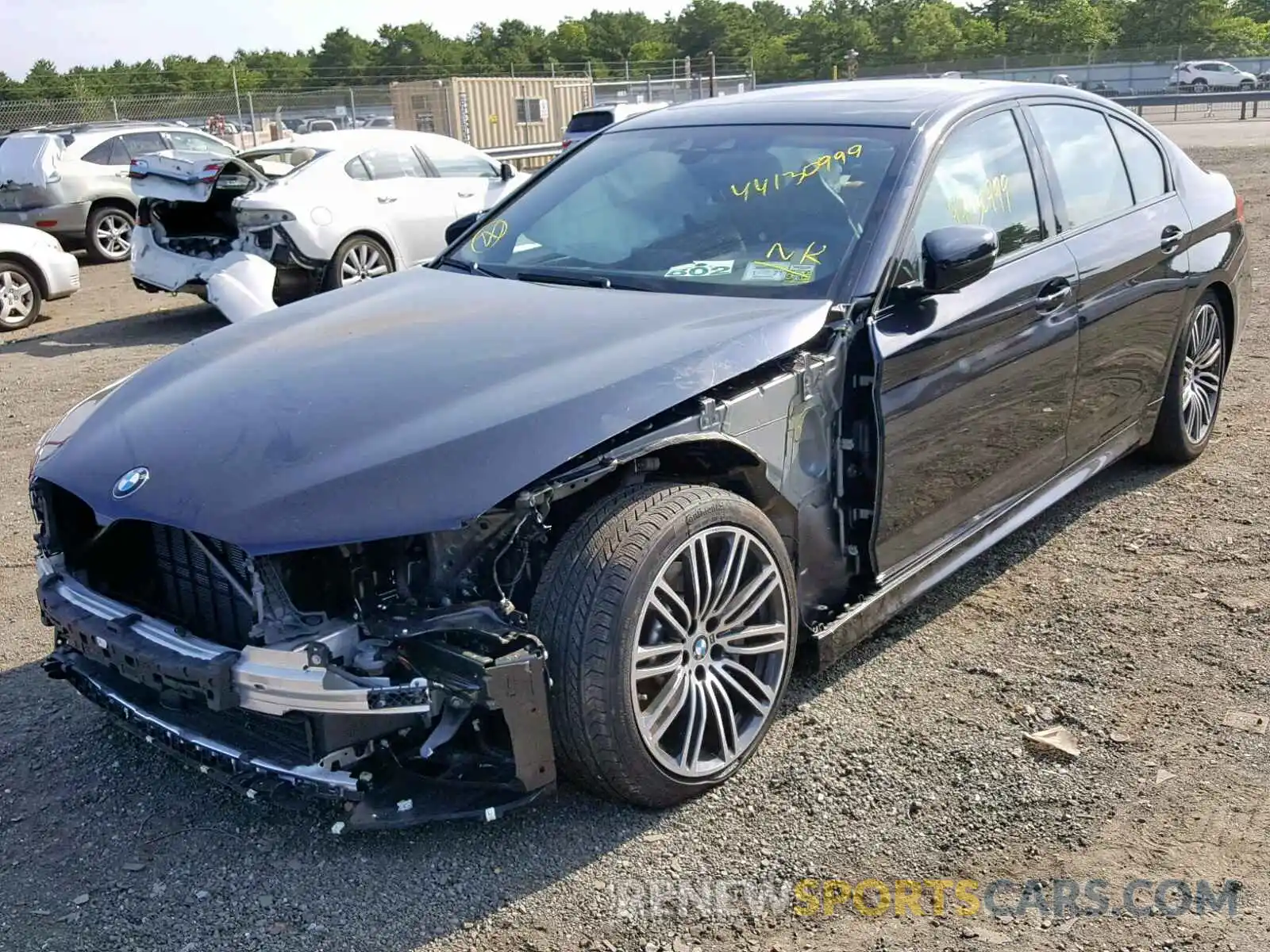 2 Photograph of a damaged car WBAJE7C52KWW11036 BMW 5 SERIES 2019