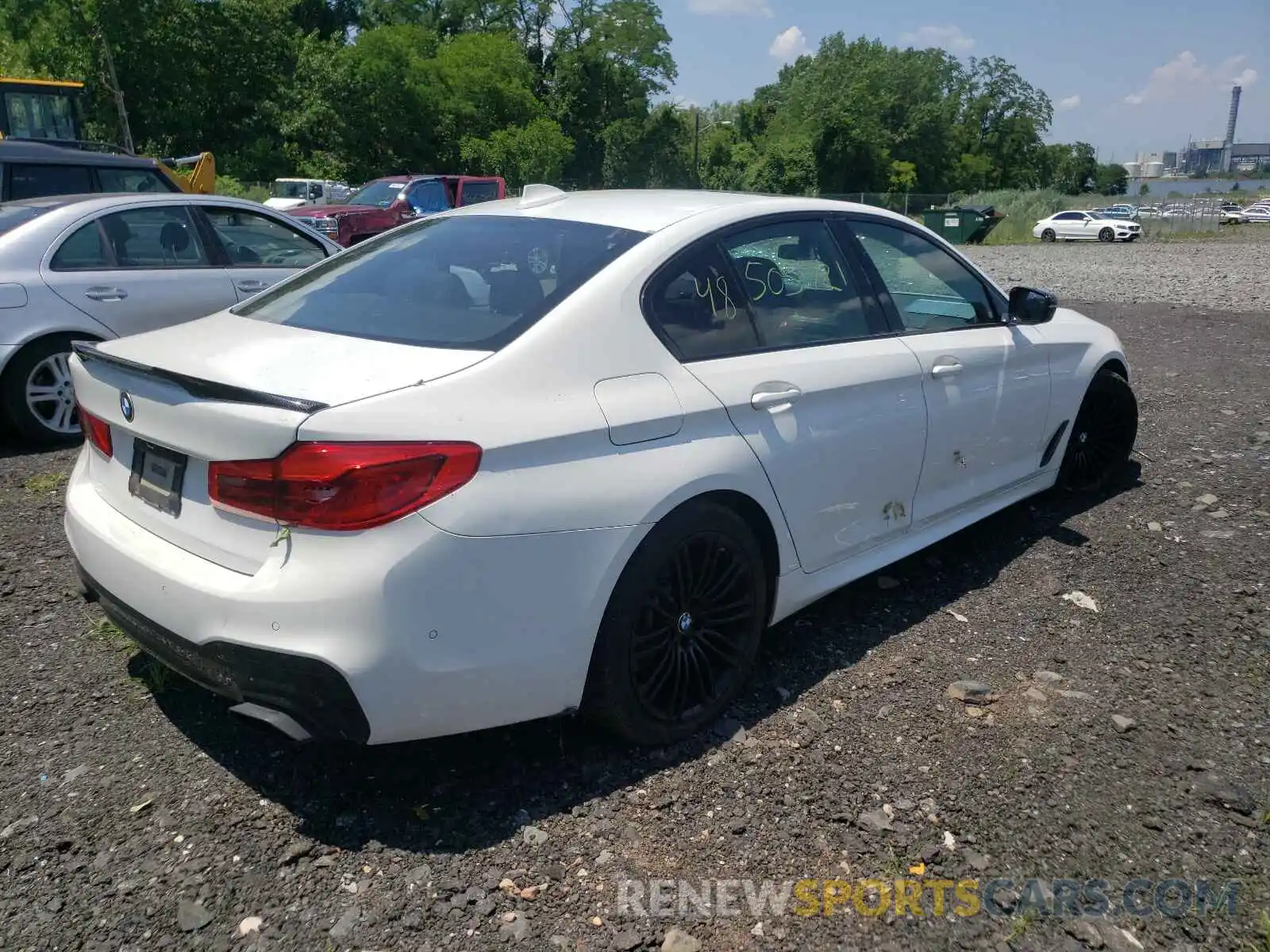 4 Photograph of a damaged car WBAJE7C52KWW14857 BMW 5 SERIES 2019