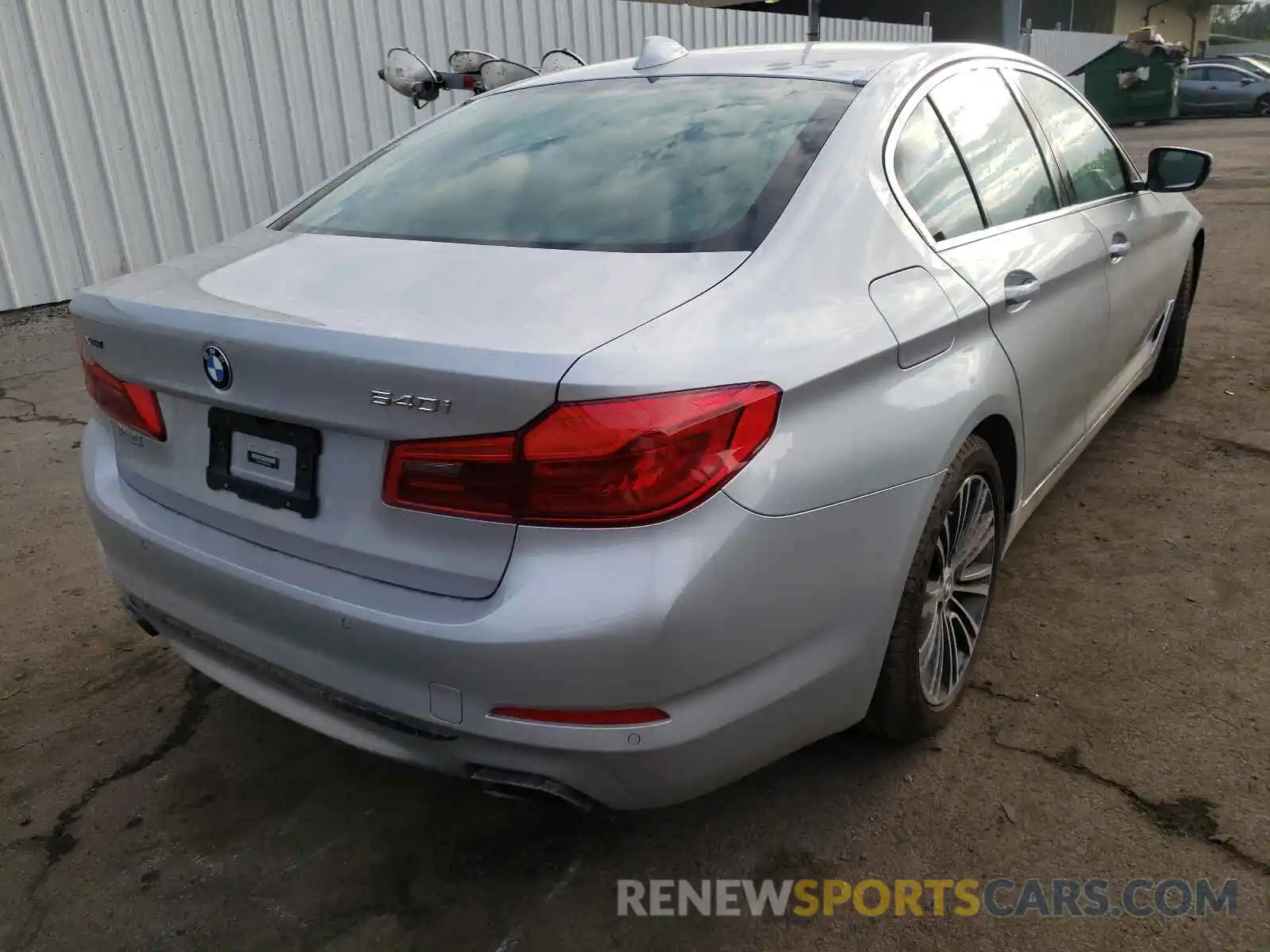 4 Photograph of a damaged car WBAJE7C52KWW30959 BMW 5 SERIES 2019