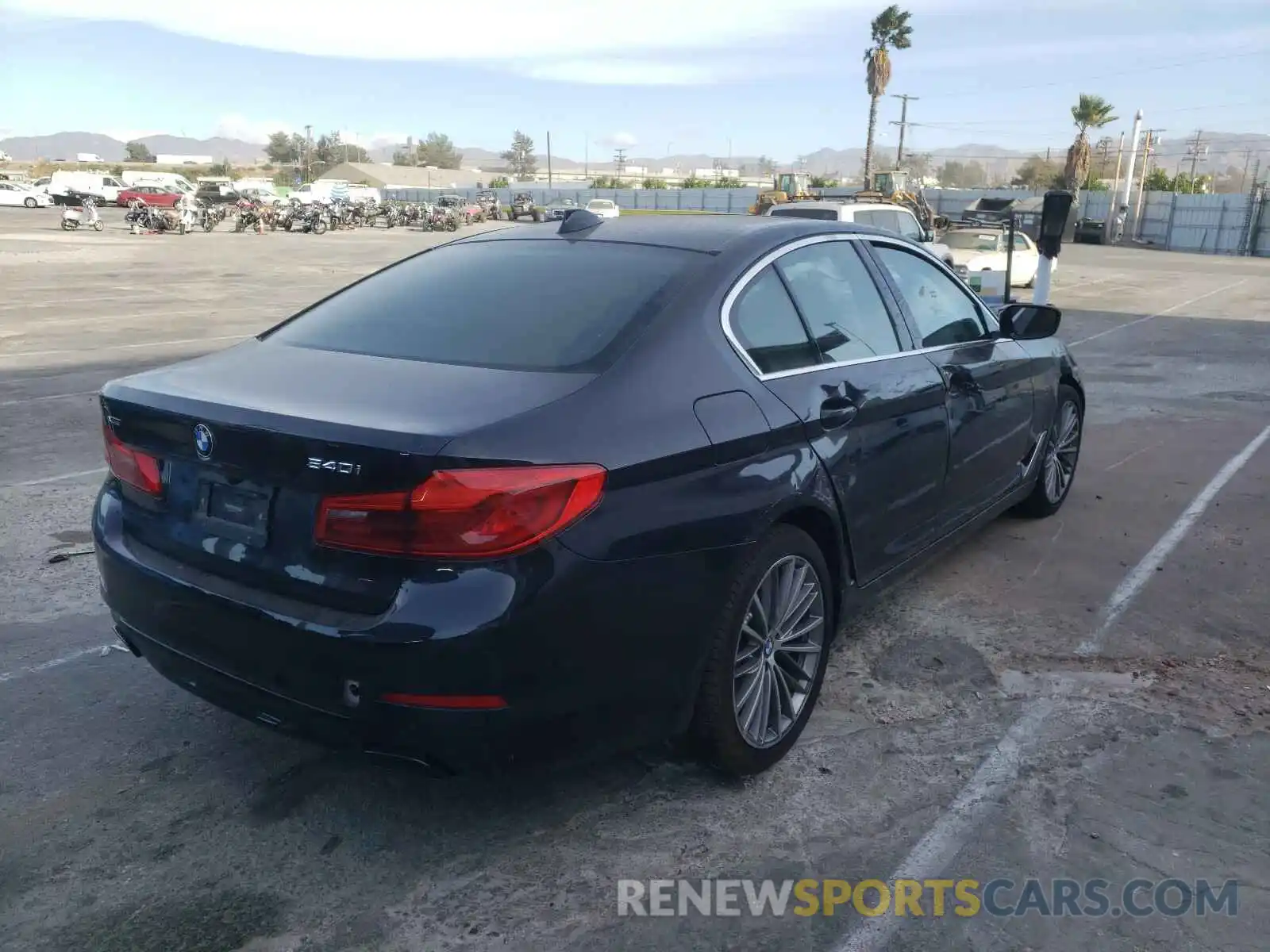 4 Photograph of a damaged car WBAJE7C54KWW07151 BMW 5 SERIES 2019