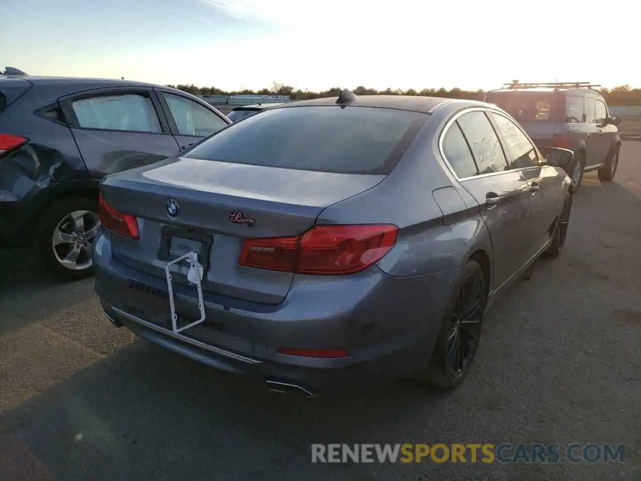 4 Photograph of a damaged car WBAJE7C55KG893182 BMW 5 SERIES 2019