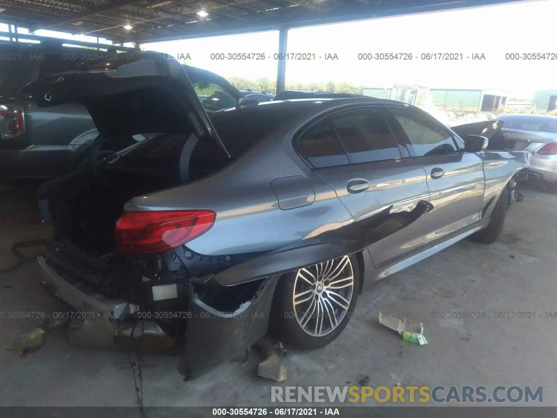 4 Photograph of a damaged car WBAJE7C55KWW24055 BMW 5 SERIES 2019