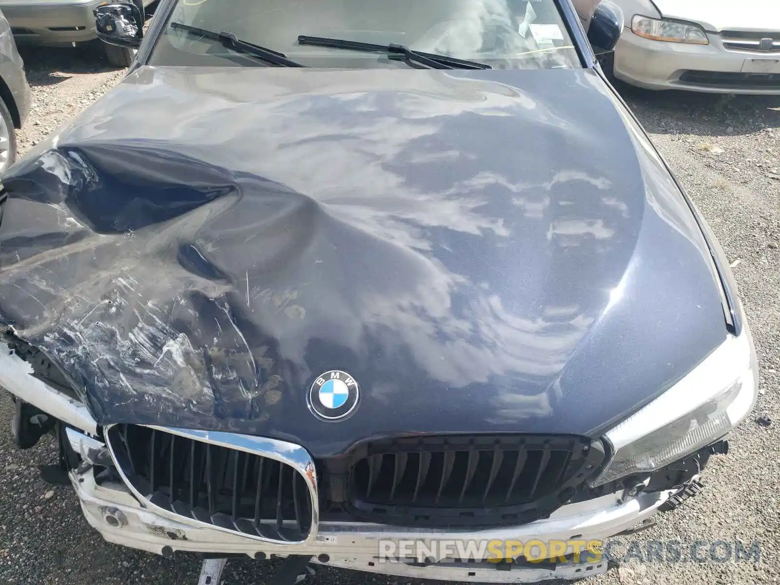 7 Photograph of a damaged car WBAJE7C56KG892574 BMW 5 SERIES 2019