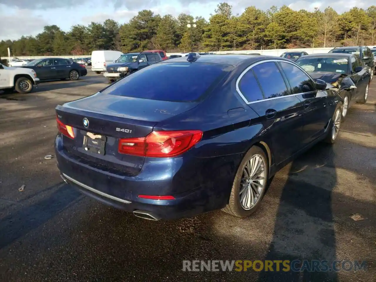 4 Photograph of a damaged car WBAJE7C58KWW11400 BMW 5 SERIES 2019