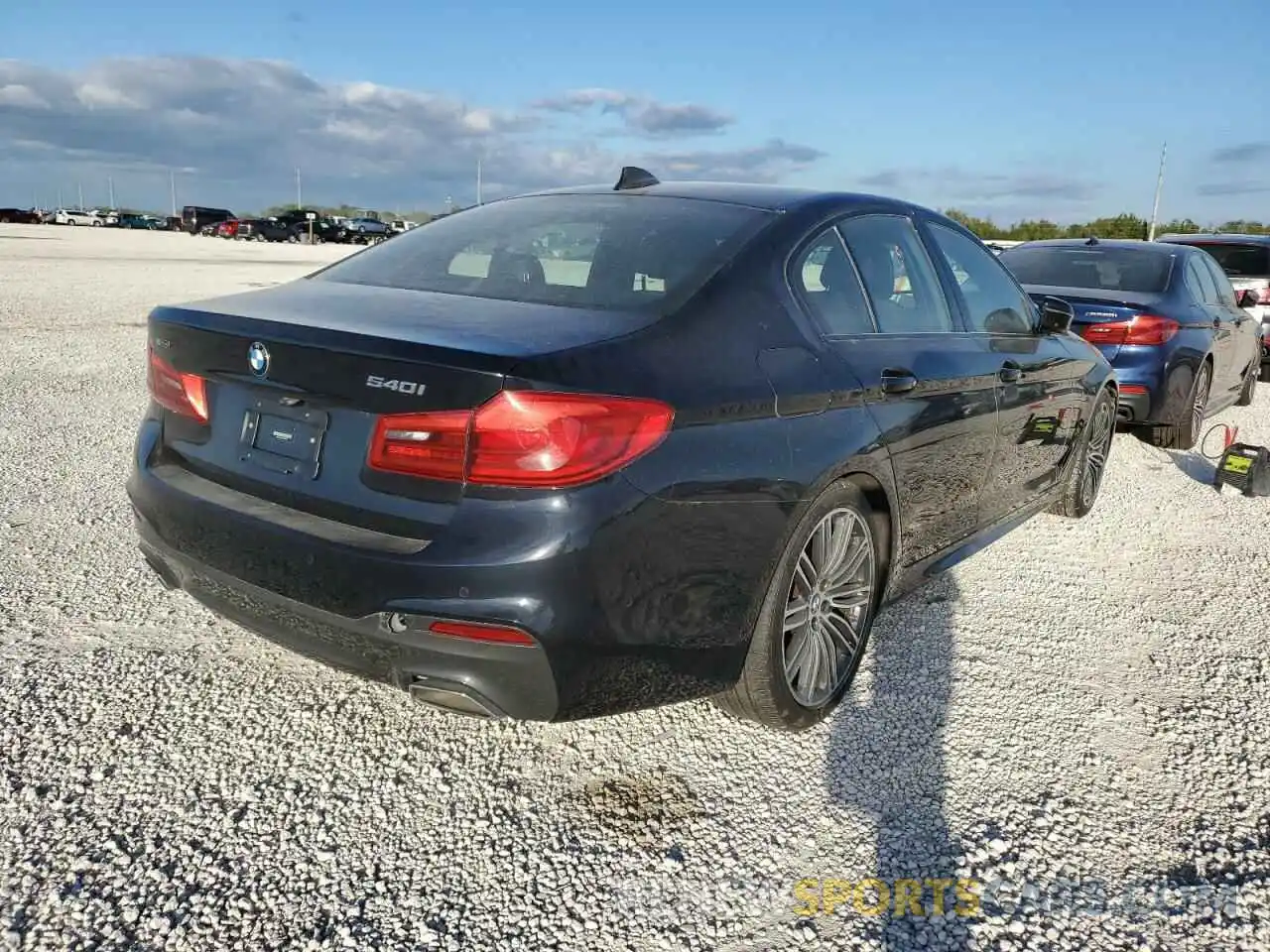 4 Photograph of a damaged car WBAJE7C59KWD53892 BMW 5 SERIES 2019