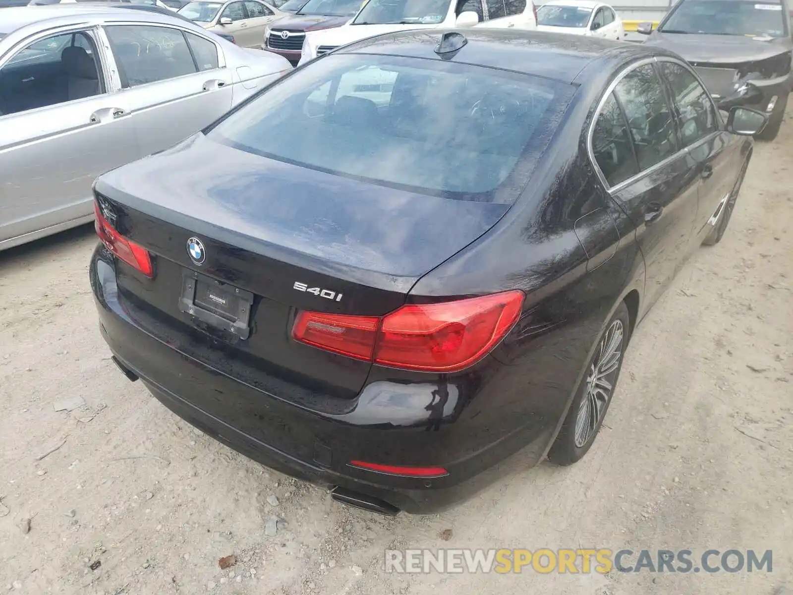 4 Photograph of a damaged car WBAJE7C59KWW17996 BMW 5 SERIES 2019