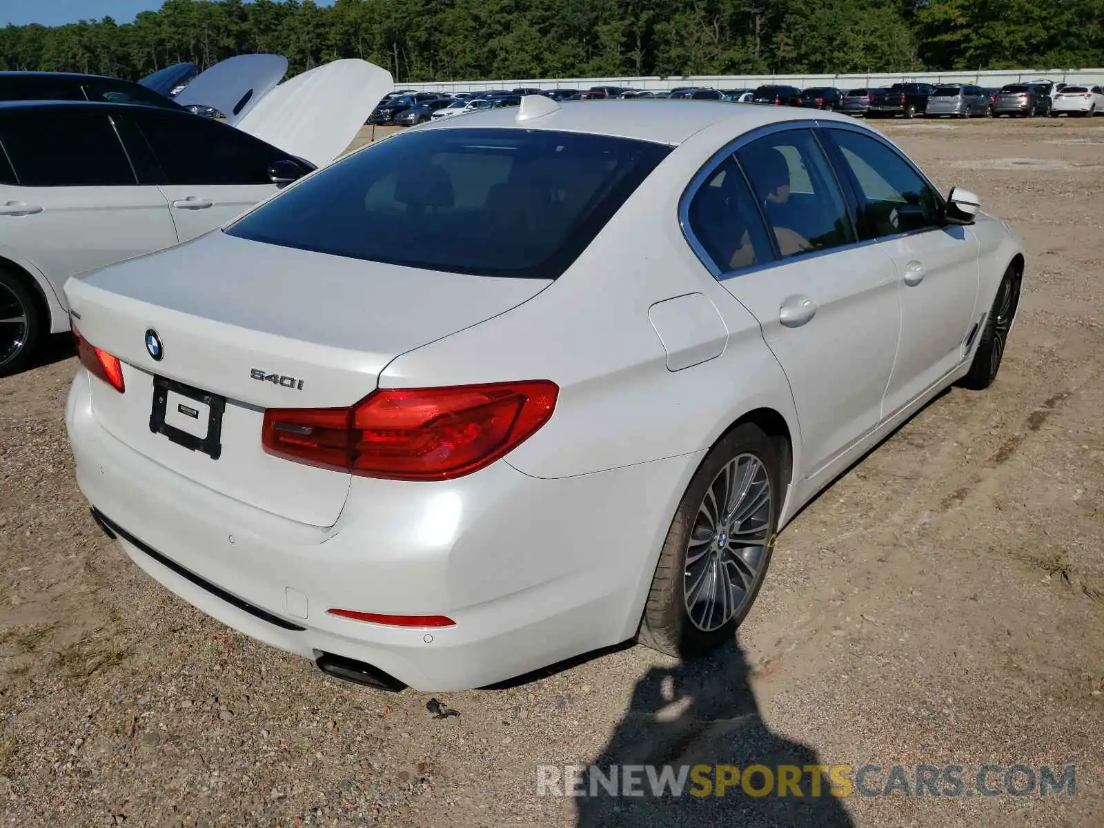 4 Photograph of a damaged car WBAJE7C5XKWW25993 BMW 5 SERIES 2019