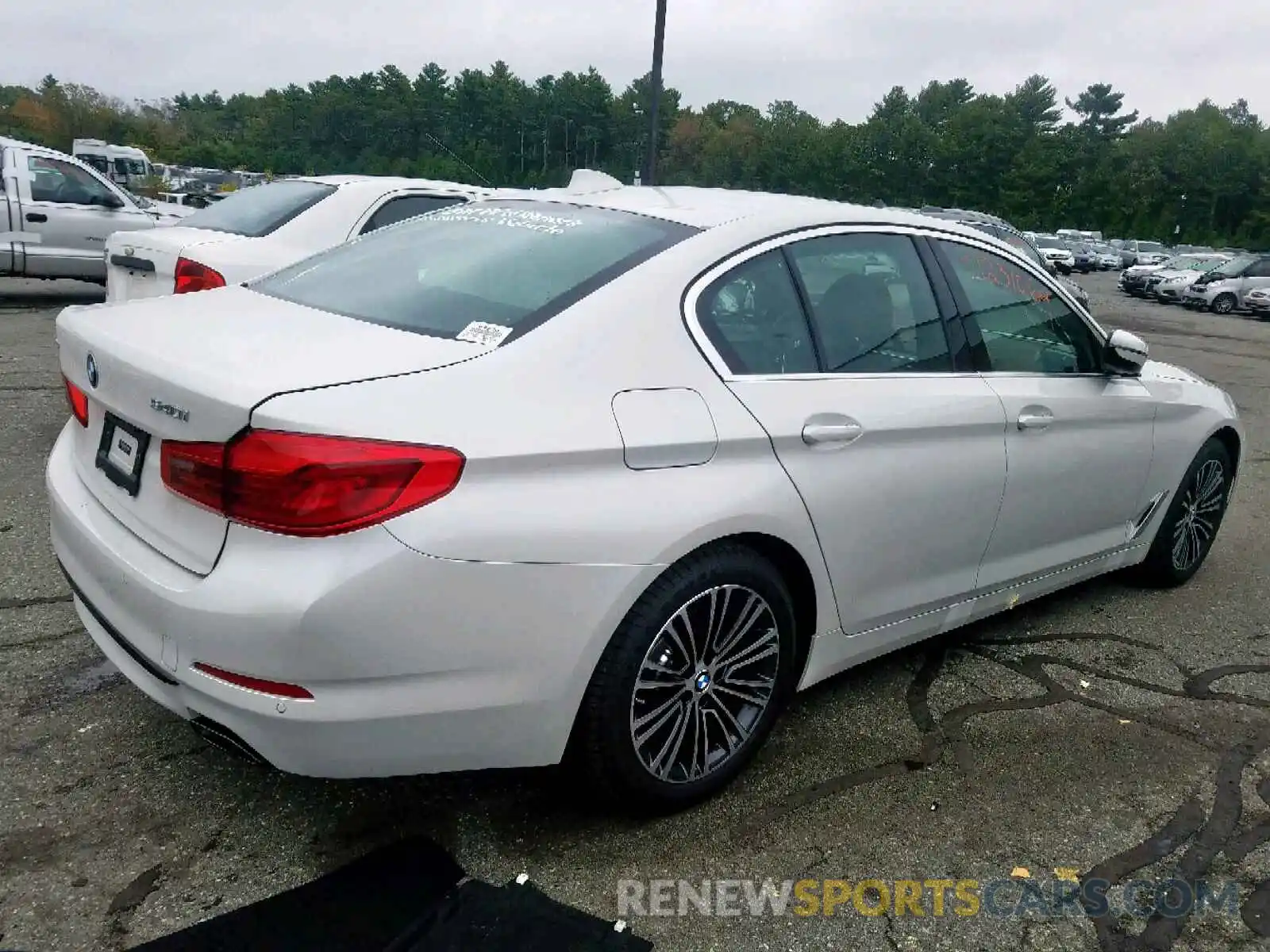 4 Photograph of a damaged car WBAJE7C5XKWW33415 BMW 5 SERIES 2019