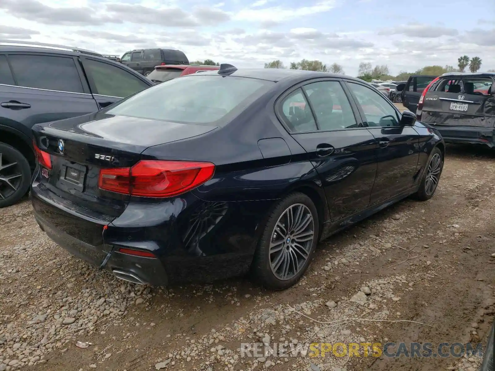 4 Photograph of a damaged car WBAJR3C09LCE31219 BMW 5 SERIES 2020