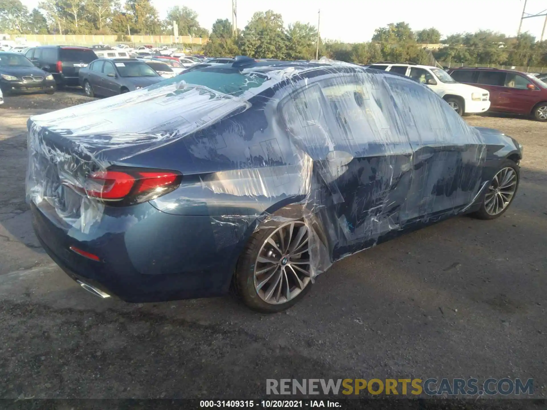 4 Photograph of a damaged car WBA73BJ01MWW98215 BMW 5 SERIES 2021