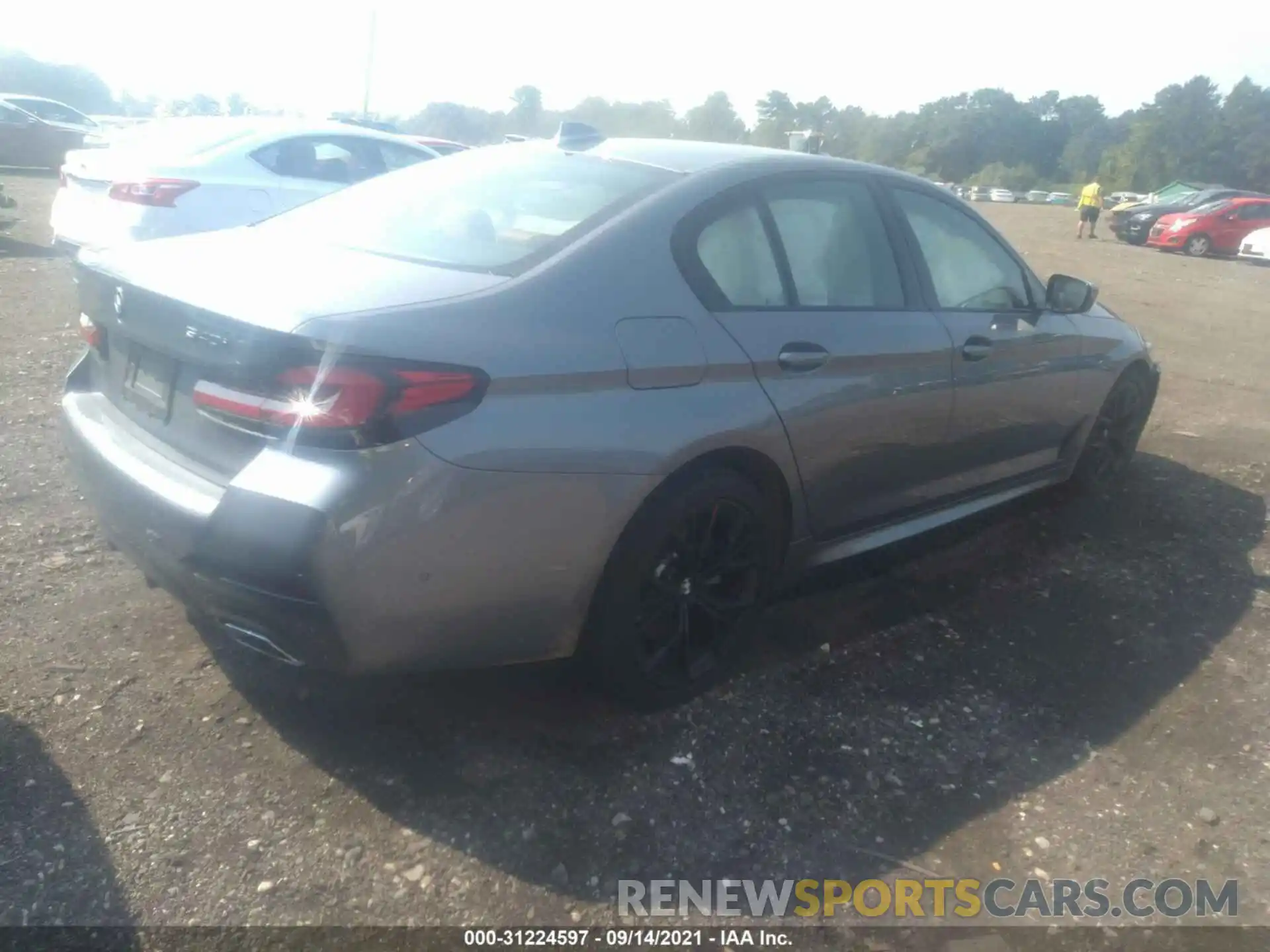 4 Photograph of a damaged car WBA73BJ0XMWX04769 BMW 5 SERIES 2021