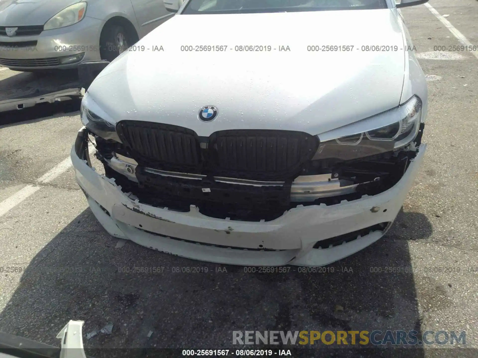 6 Photograph of a damaged car WBAJE5C52KWW08853 BMW 540 2019