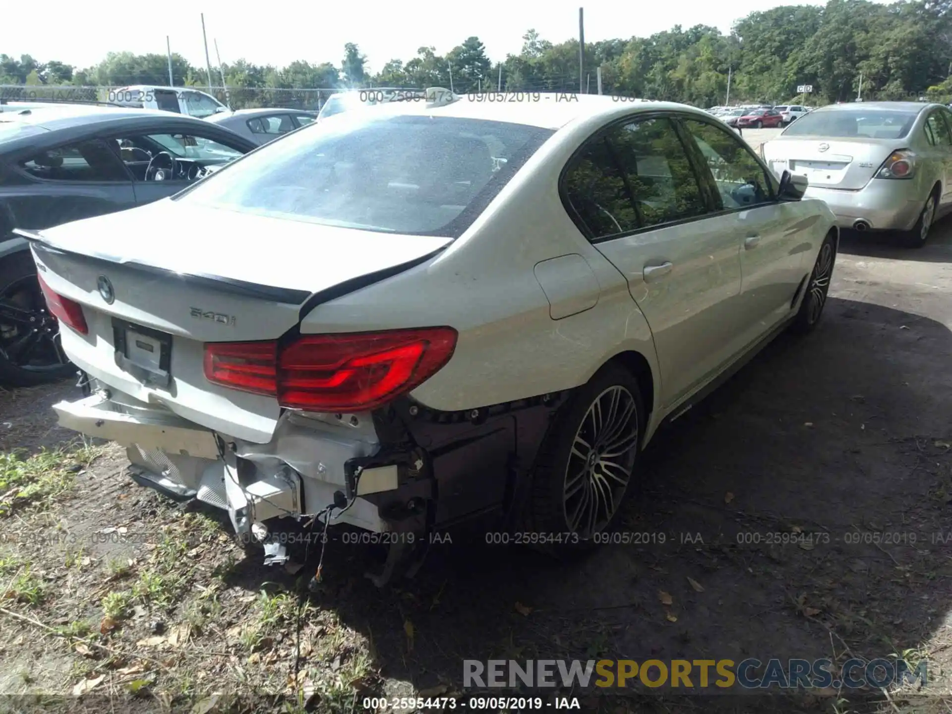 4 Photograph of a damaged car WBAJE7C56KWW33928 BMW 540 2019