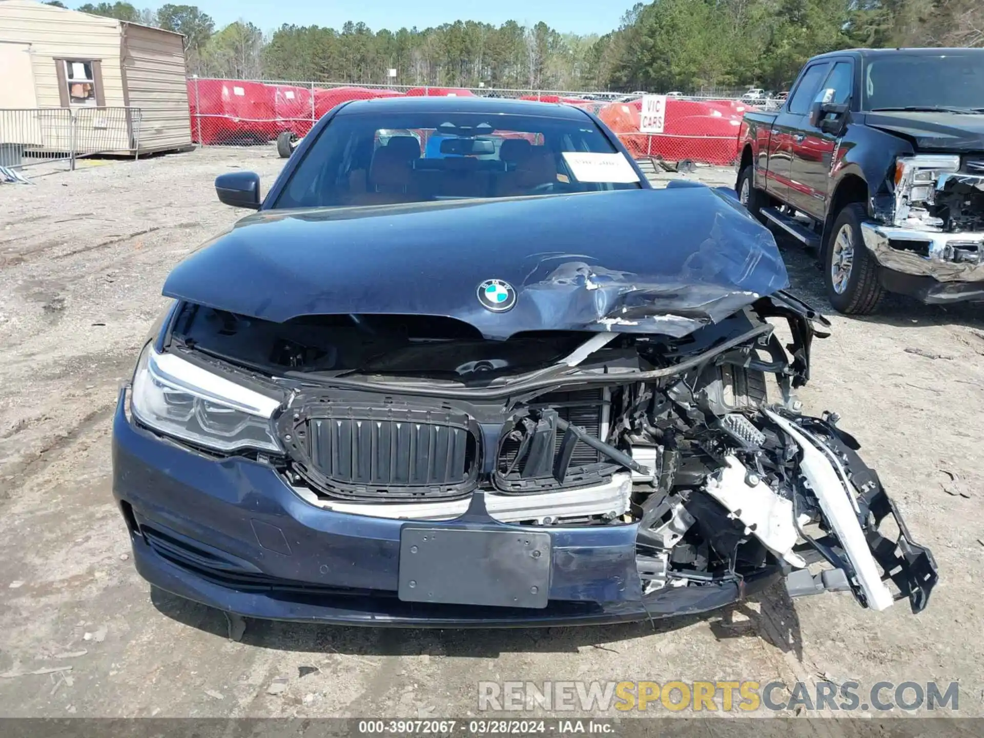 12 Photograph of a damaged car WBAJE5C5XKWW14481 BMW 540I 2019