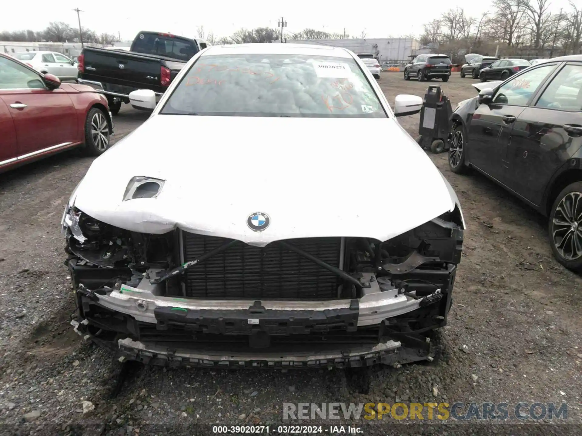 12 Photograph of a damaged car WBAJE7C57KWW14868 BMW 540I 2019