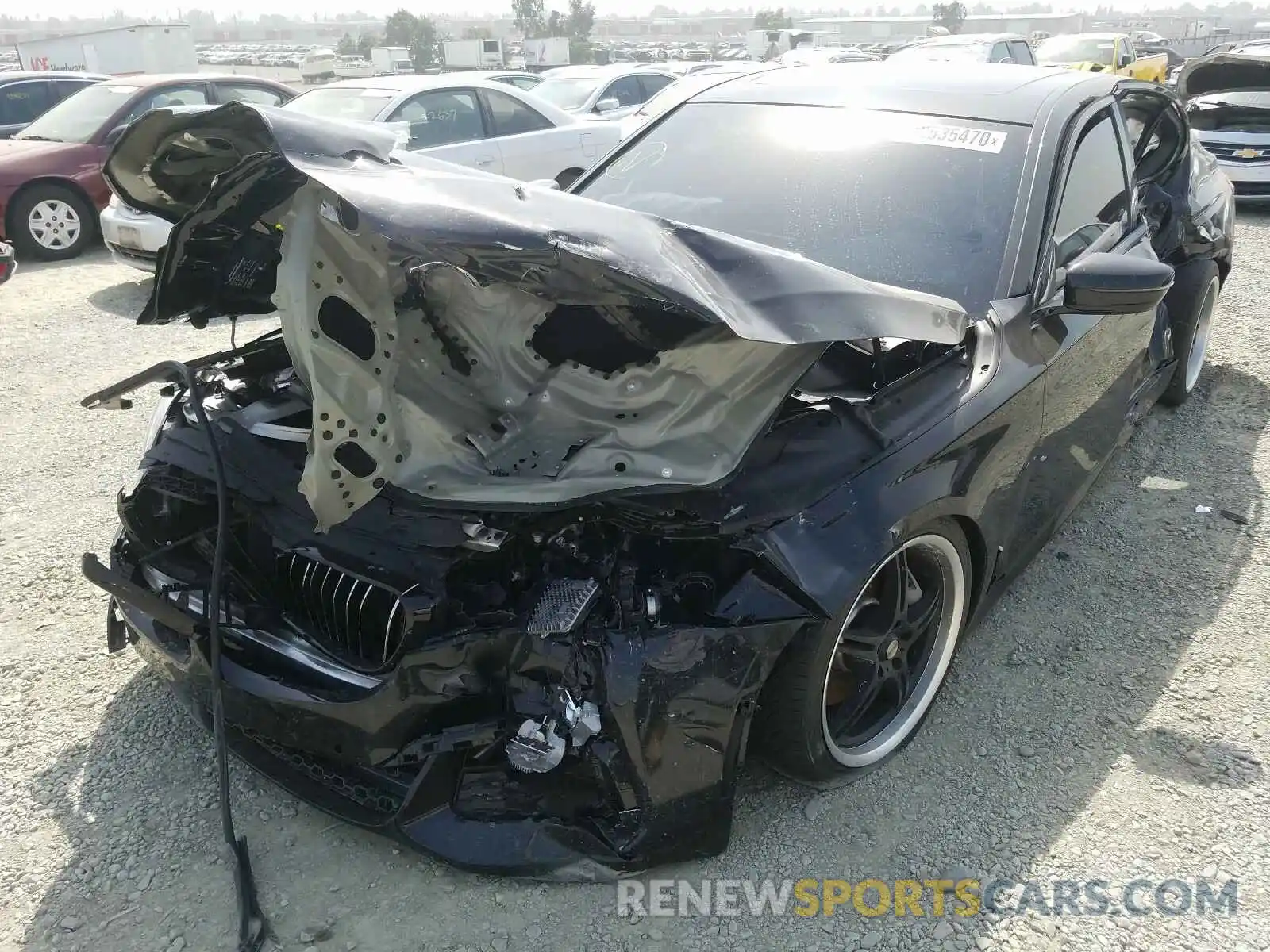 2 Photograph of a damaged car WBA7E2C50KB217894 BMW 7 SERIES 2019