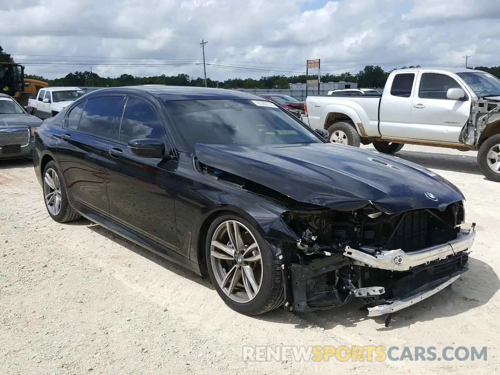 1 Фотография поврежденного автомобиля WBA7E2C5XKB454845 BMW 7 SERIES 2019