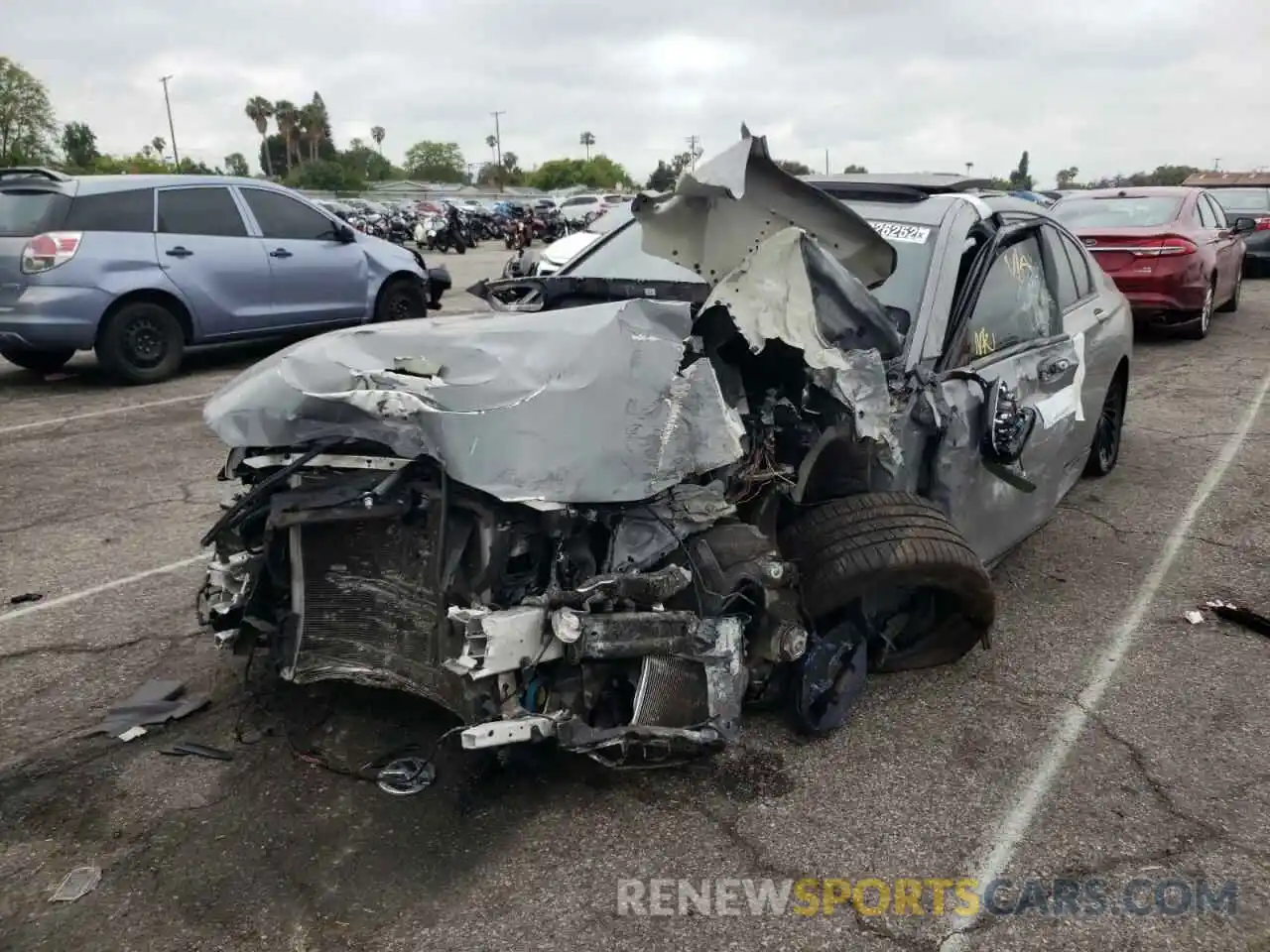 2 Photograph of a damaged car WBA7F2C11KB242328 BMW 7 SERIES 2019