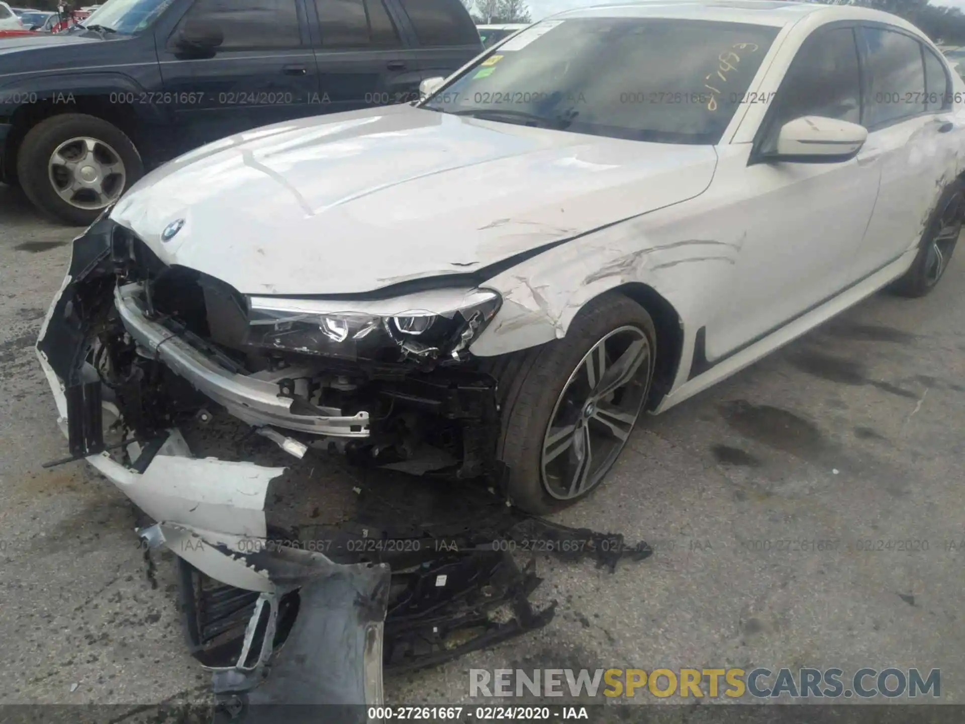 6 Photograph of a damaged car WBA7E2C54KB217493 BMW 740 2019