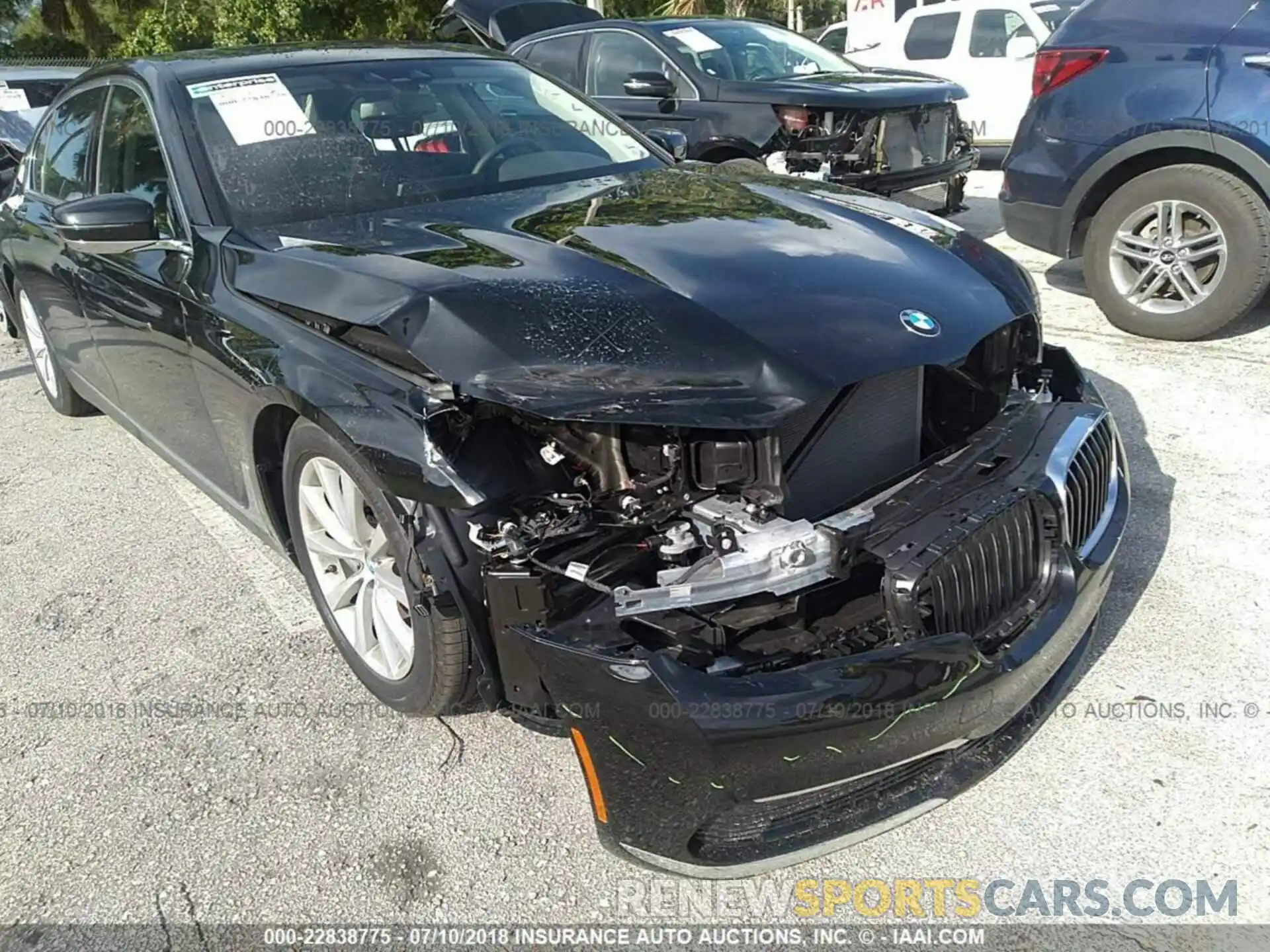 6 Photograph of a damaged car WBA7E2C56KB216555 Bmw 740 2019