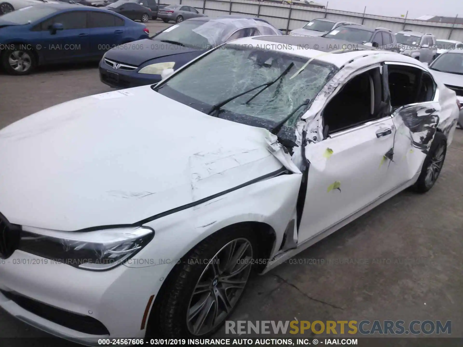 6 Photograph of a damaged car WBA7E2C58KB216685 BMW 740 2019