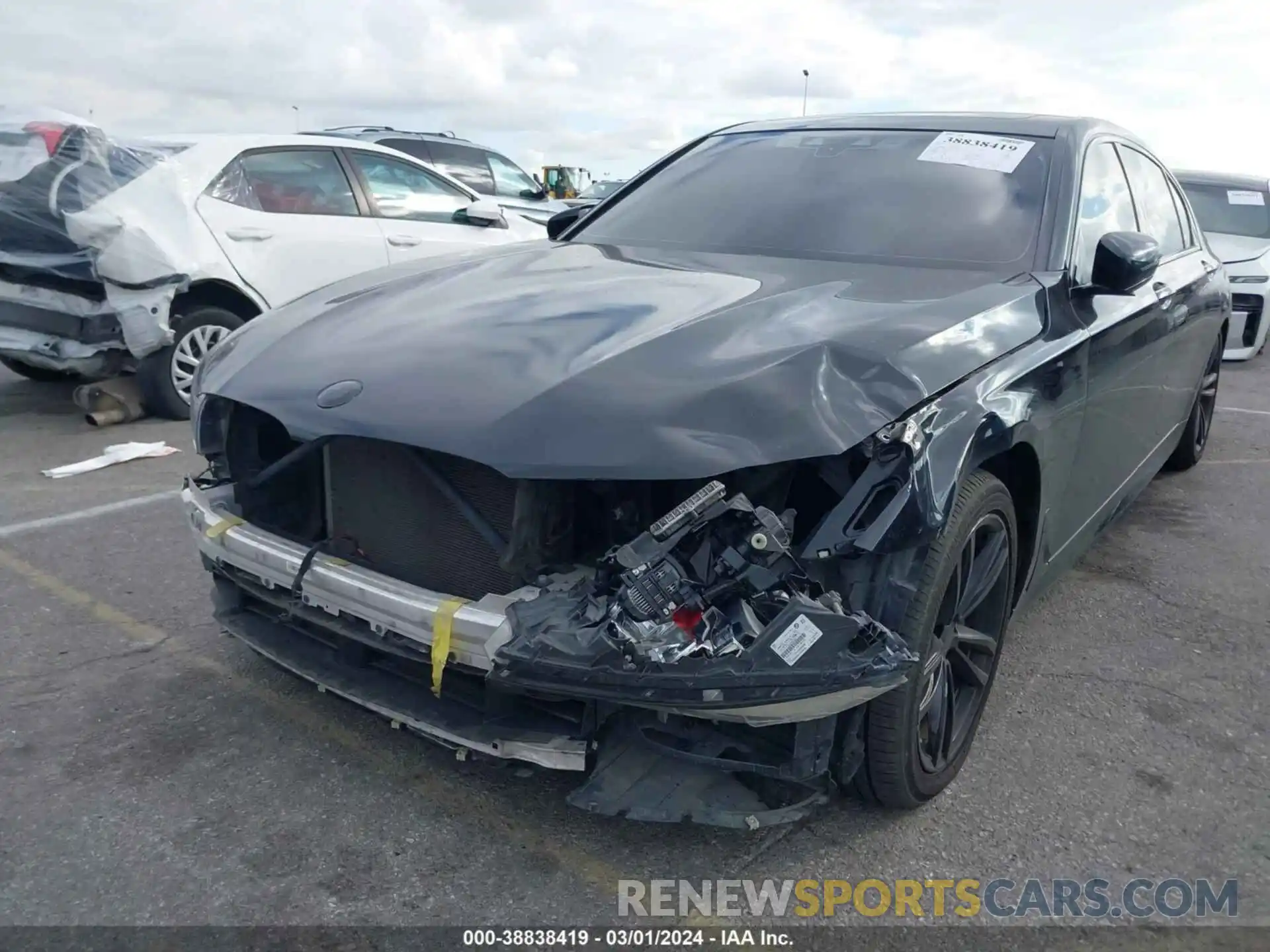 6 Photograph of a damaged car WBA7E2C59KB216663 BMW 740I 2019