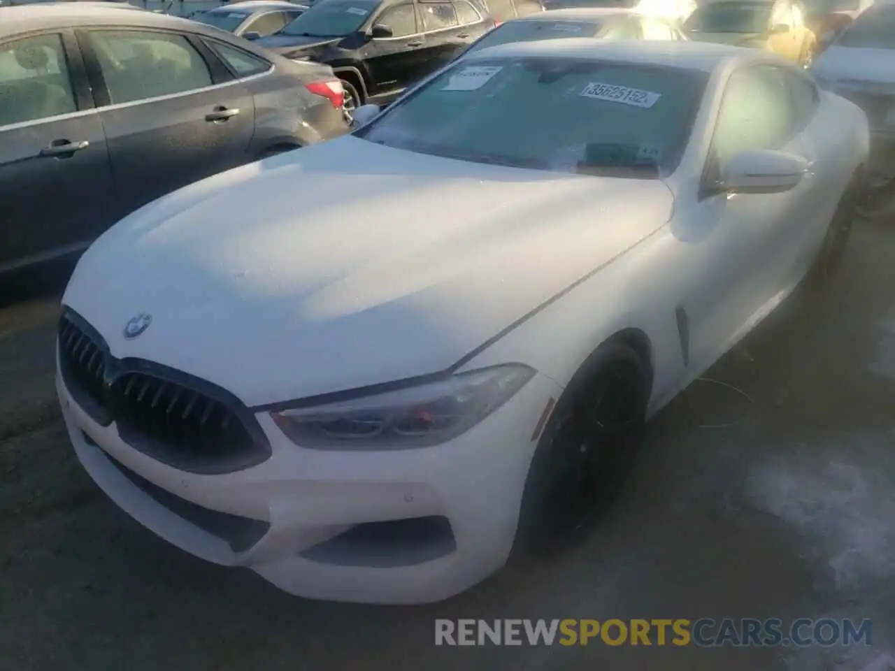 2 Photograph of a damaged car WBAAE4C07MCG76412 BMW 8 SERIES 2021