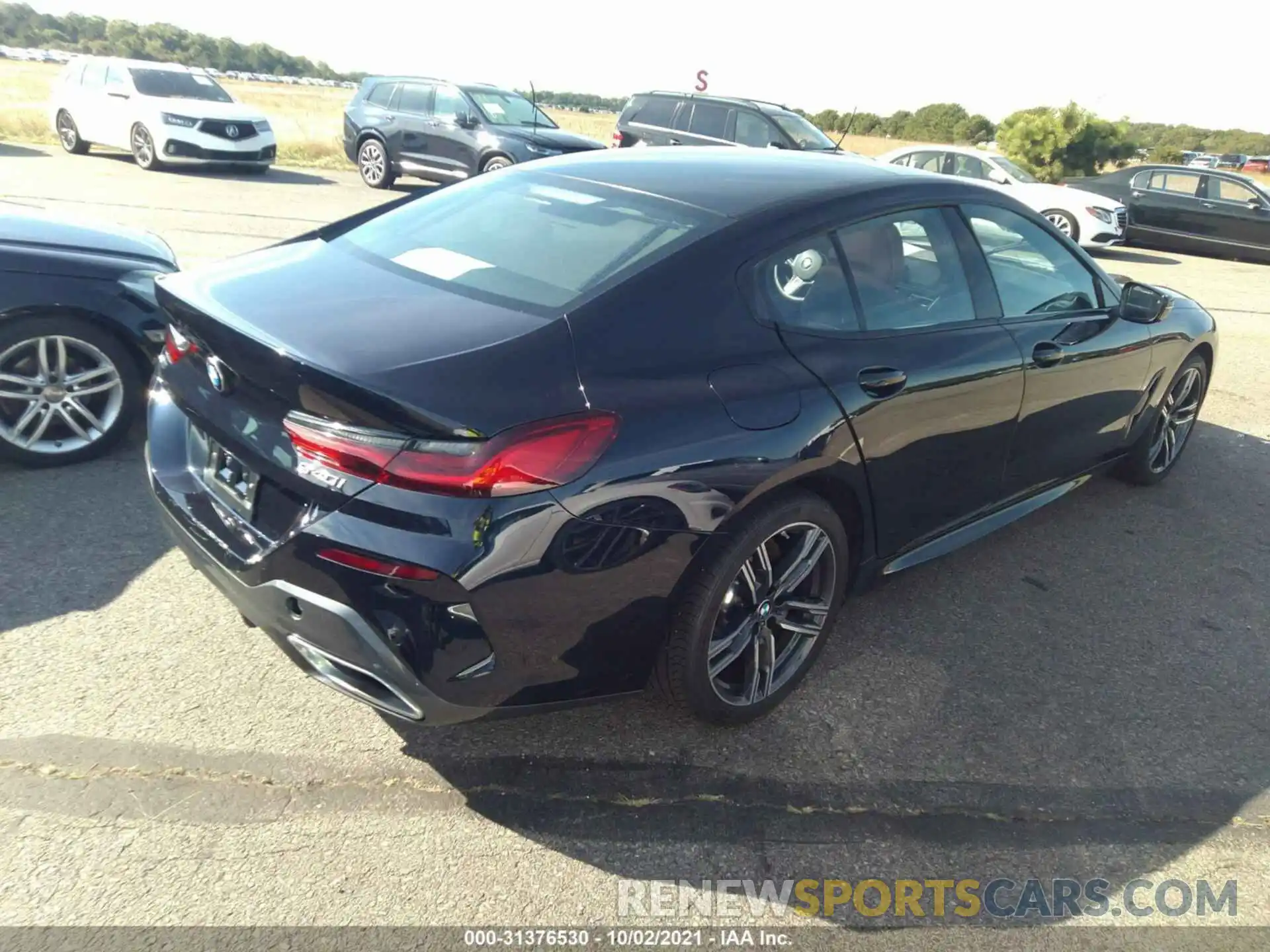 4 Photograph of a damaged car WBAGV4C07MCF75865 BMW 8 SERIES 2021