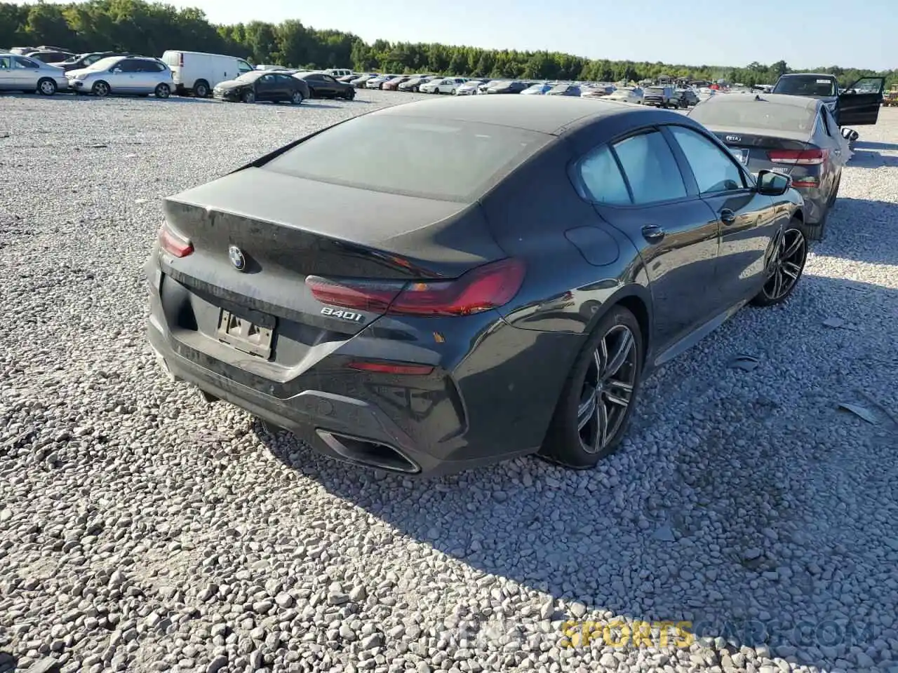 4 Photograph of a damaged car WBAGV4C09MCF85748 BMW 8 SERIES 2021