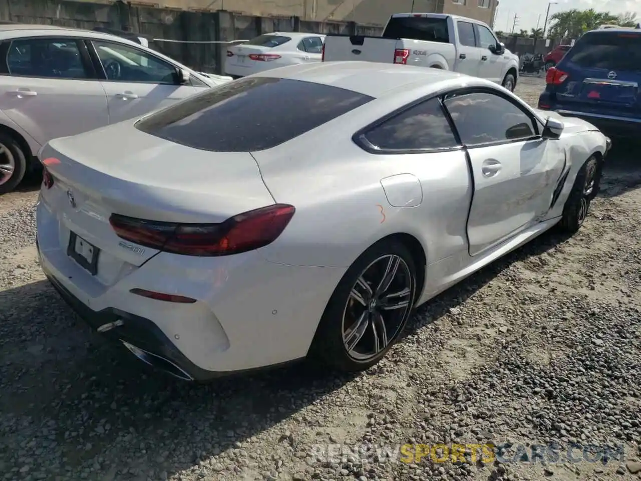 4 Photograph of a damaged car WBAAE2C06NCH15321 BMW 8 SERIES 2022