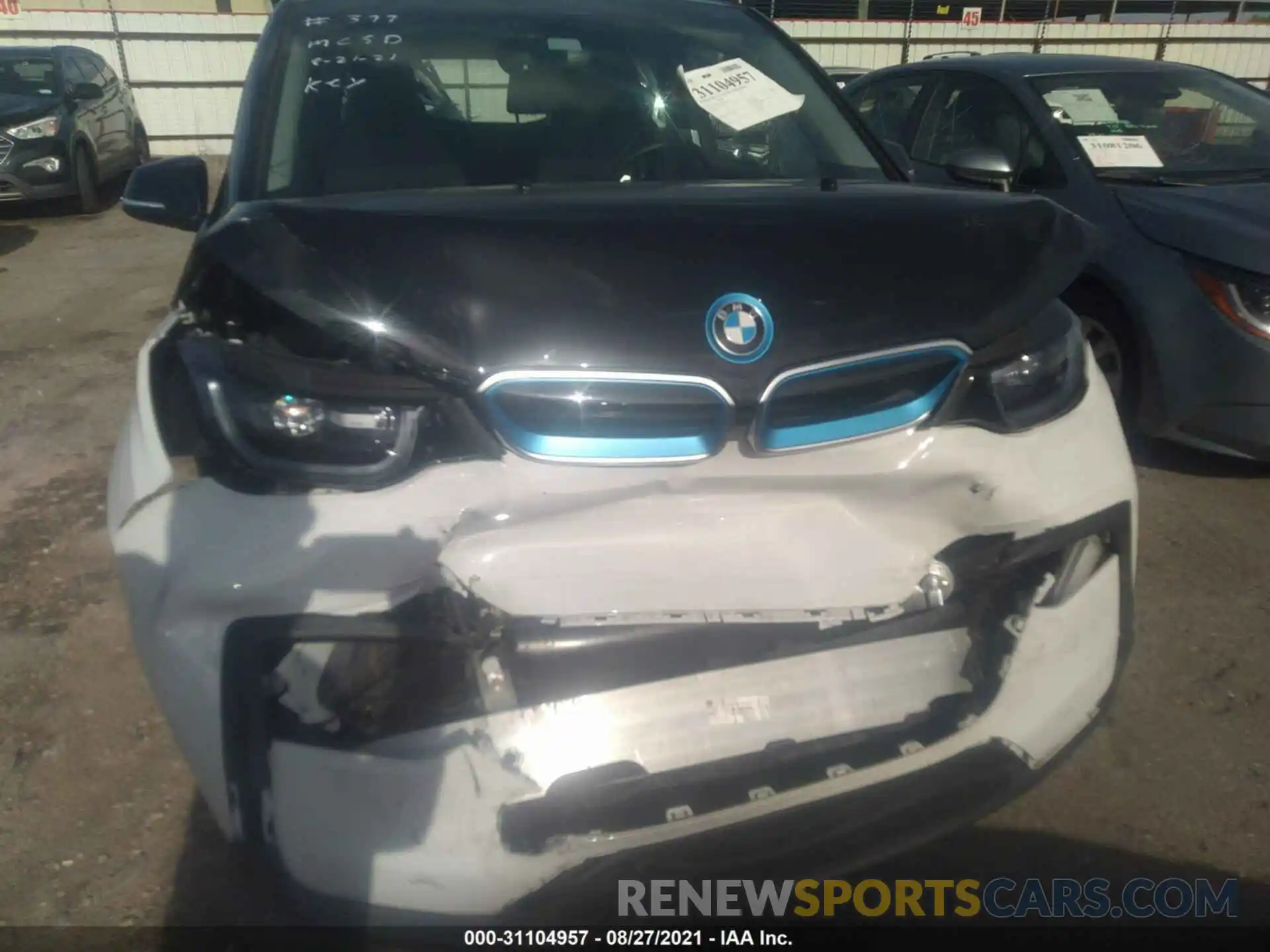 6 Photograph of a damaged car WBY8P4C5XK7E65927 BMW I3 2019