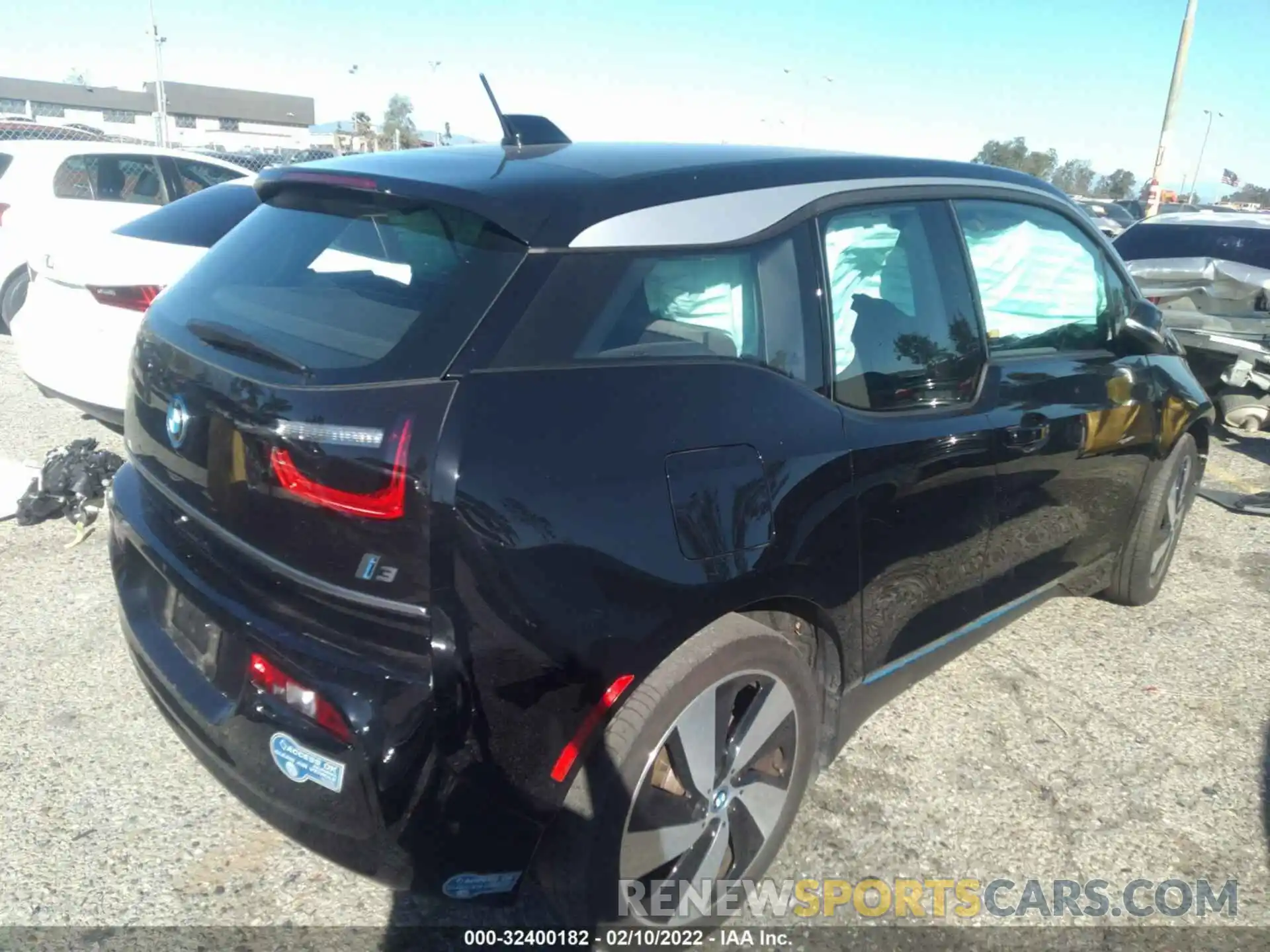 4 Photograph of a damaged car WBY8P2C09M7H63610 BMW I3 2021