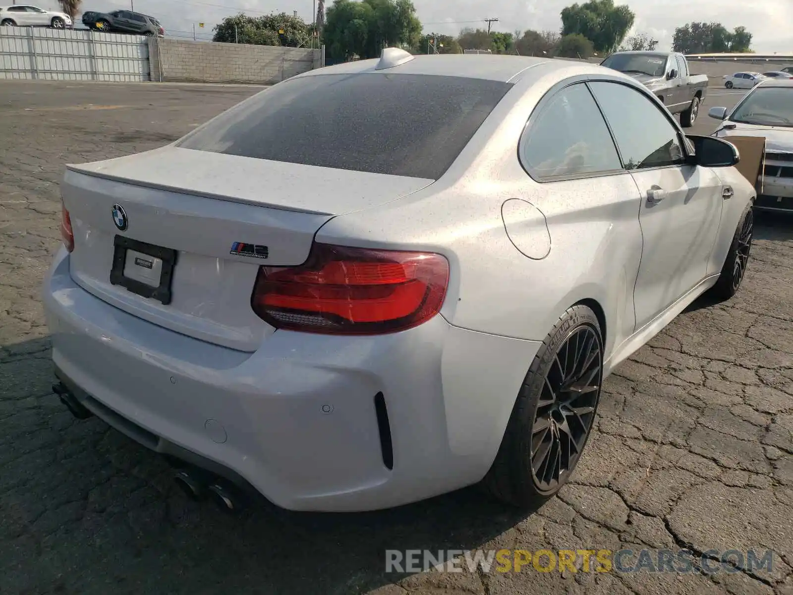 4 Photograph of a damaged car WBS2U7C07L7F00181 BMW M2 2020