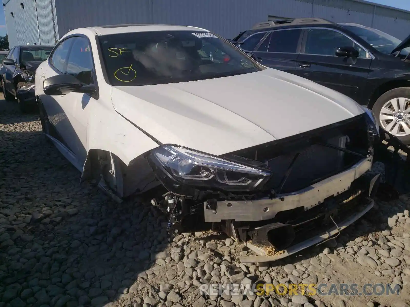 1 Photograph of a damaged car WBA13AL06M7H13494 BMW M2 2021