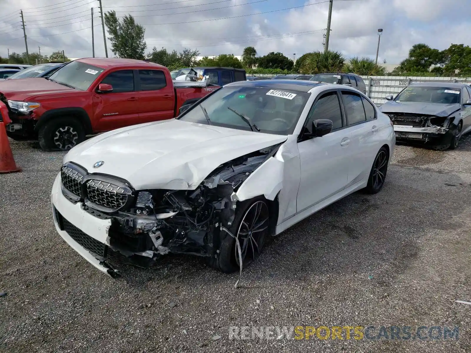 2 Photograph of a damaged car 3MW5U7J01L8B35352 BMW M3 2020