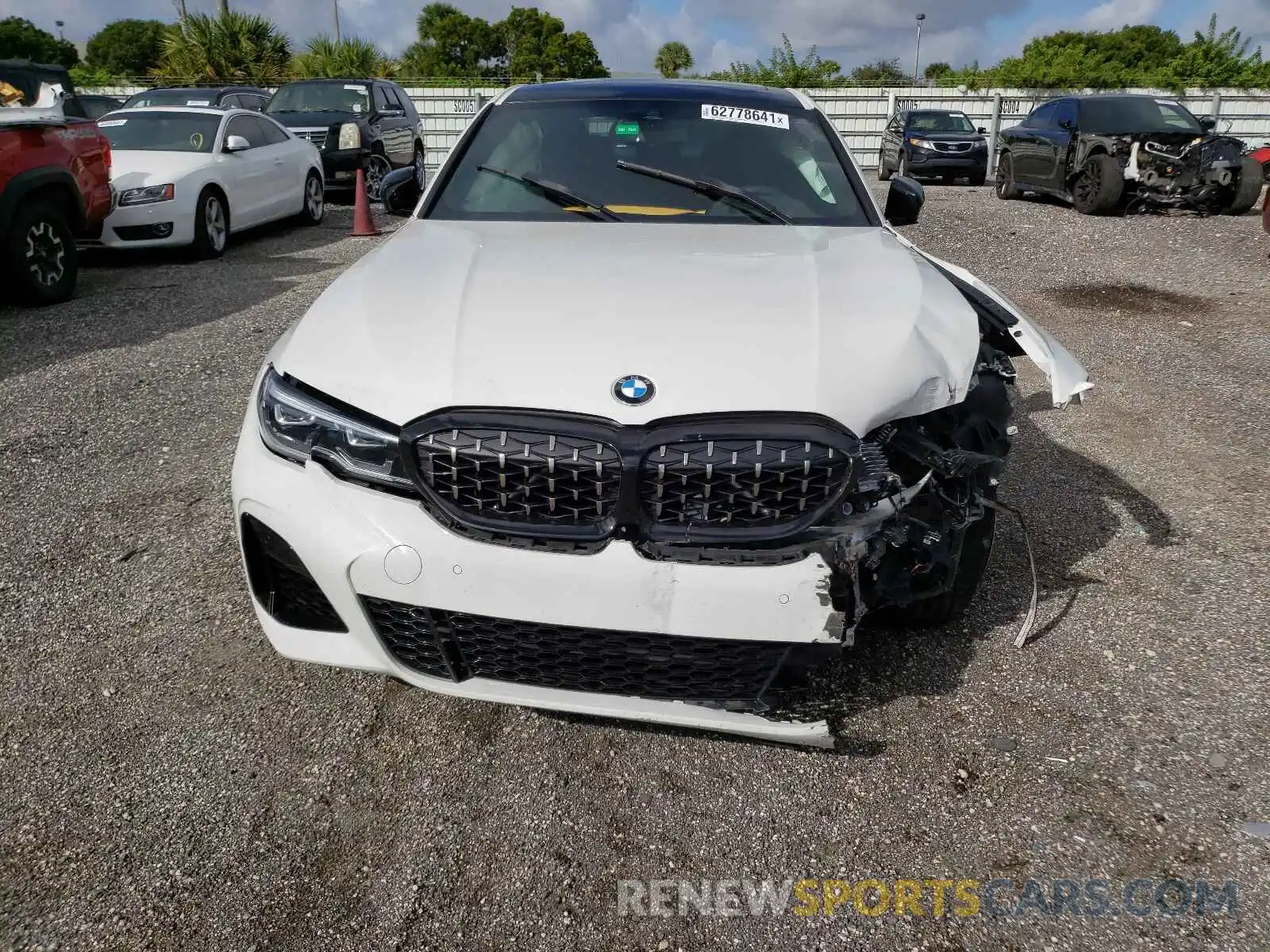 9 Photograph of a damaged car 3MW5U7J01L8B35352 BMW M3 2020