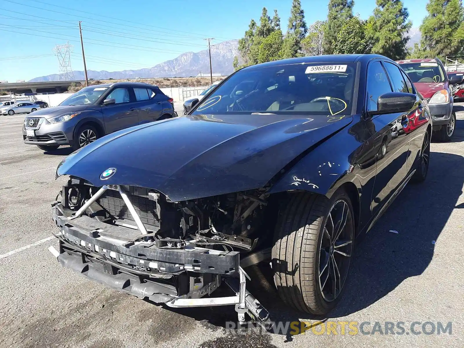 2 Photograph of a damaged car 3MW5U7J05L8B28937 BMW M3 2020