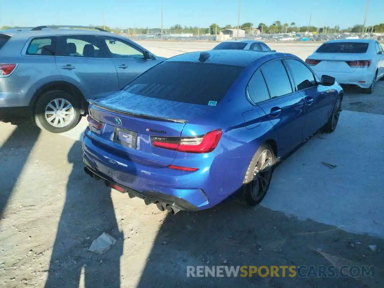 4 Photograph of a damaged car 3MW5U7J06L8B33211 BMW M3 2020