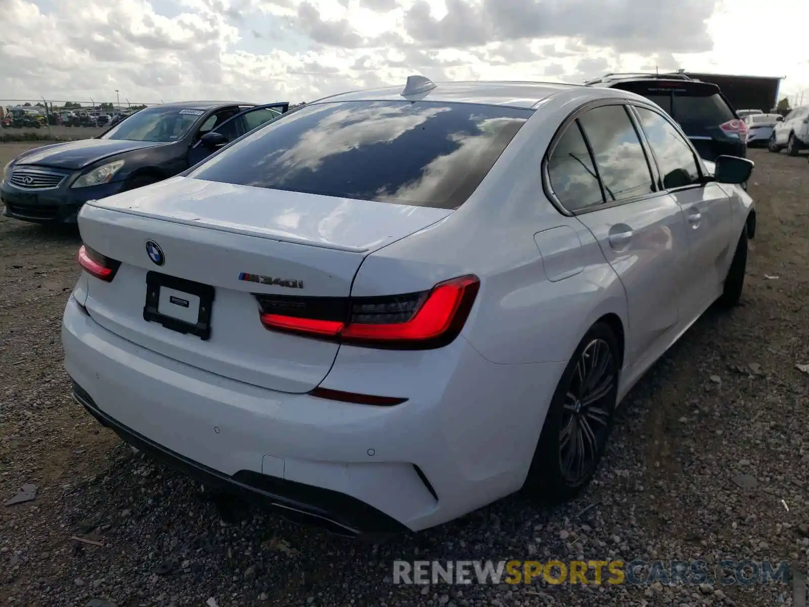 4 Photograph of a damaged car 3MW5U7J07L8B39387 BMW M3 2020