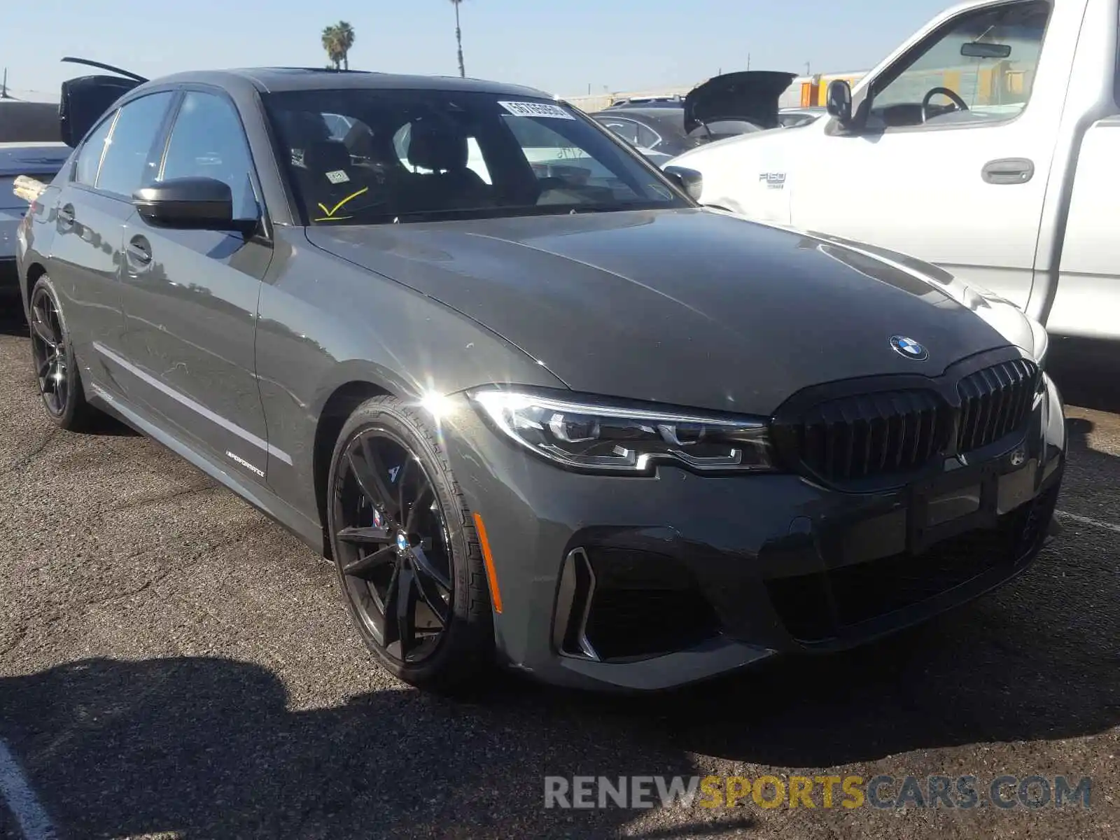 1 Photograph of a damaged car WBA5U7C02LFJ16572 BMW M3 2020