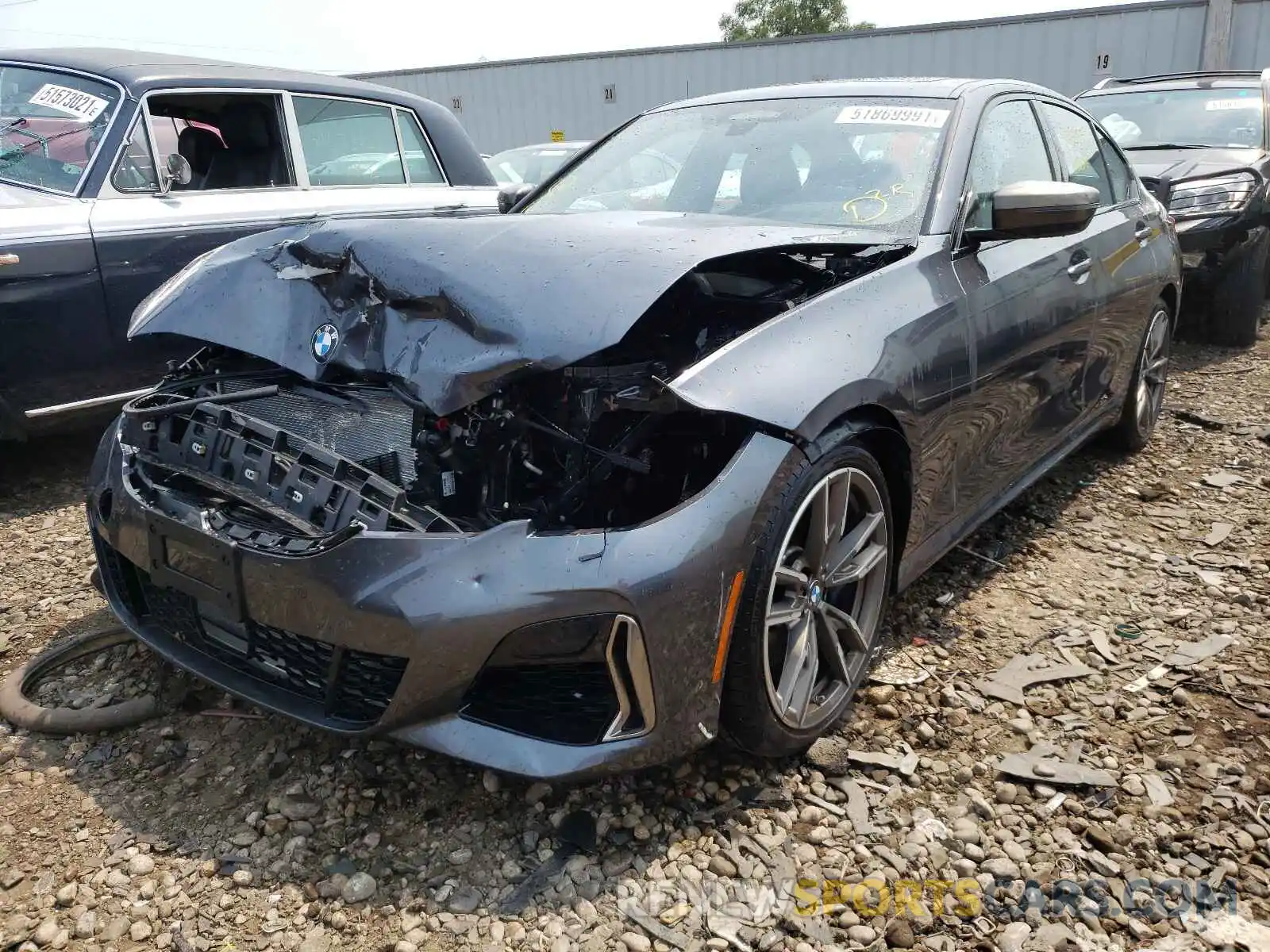 2 Photograph of a damaged car WBA5U9C03LFH35079 BMW M3 2020