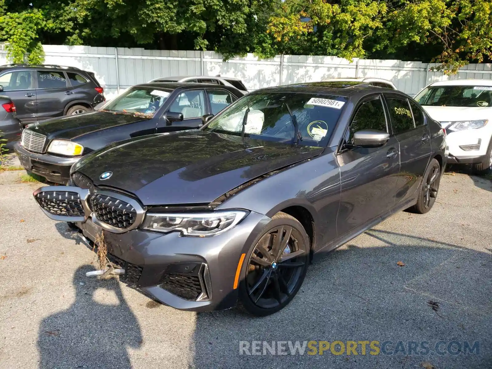 2 Photograph of a damaged car WBA5U9C05LA379325 BMW M3 2020