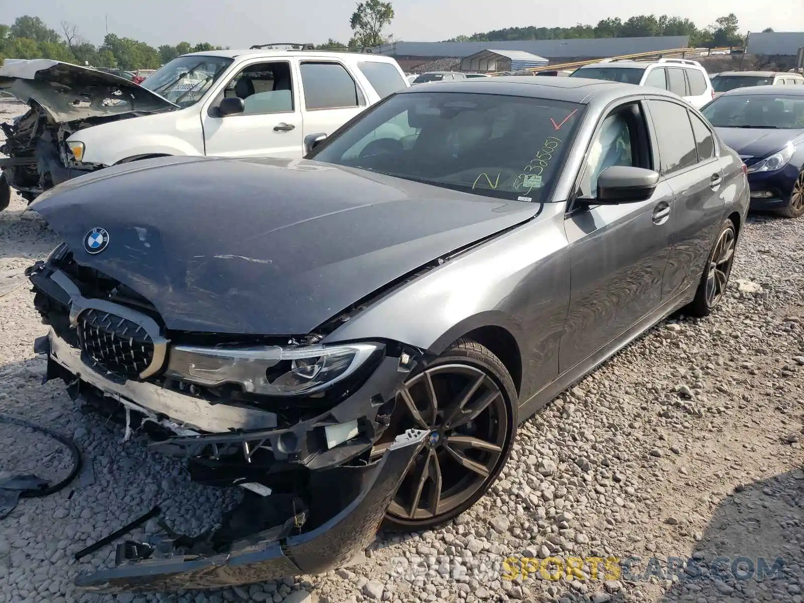 2 Photograph of a damaged car WBA5U9C05LA383343 BMW M3 2020