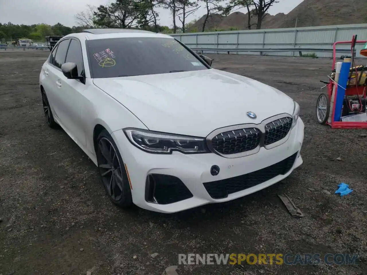 1 Photograph of a damaged car WBA5U9C06LFJ90380 BMW M3 2020