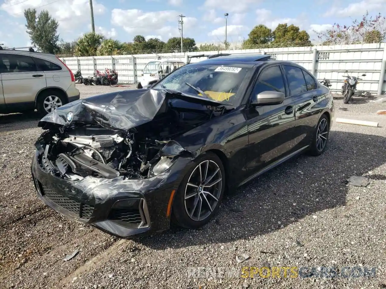 2 Photograph of a damaged car 3MW5U7J07M8B51945 BMW M3 2021